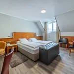 Neue Post I Self Check-in Hotell